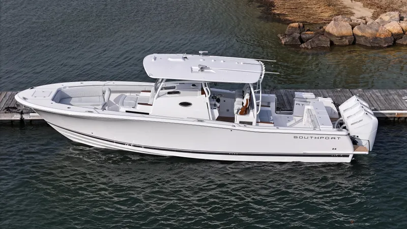 Slide: The Image of Control panel of 2025 Southport 38 FE boat with modern navigation equipment. - 48