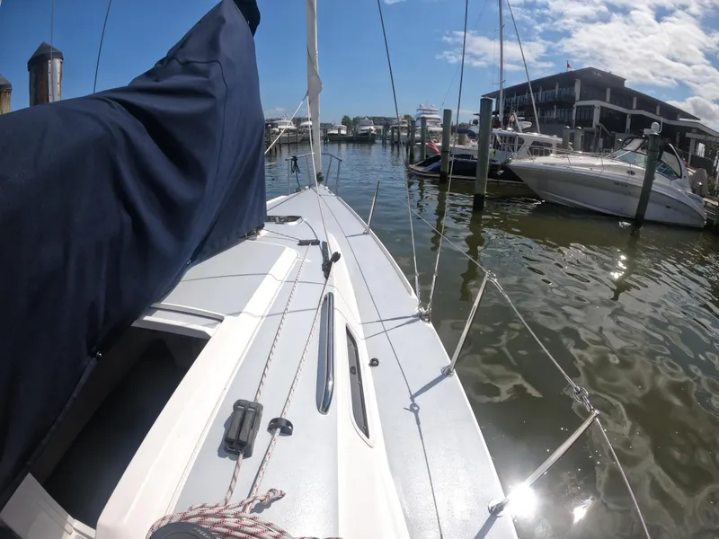 Slide: The Image of 2022 J Boats J/9 sailboat docked in a sunny marina. - 18