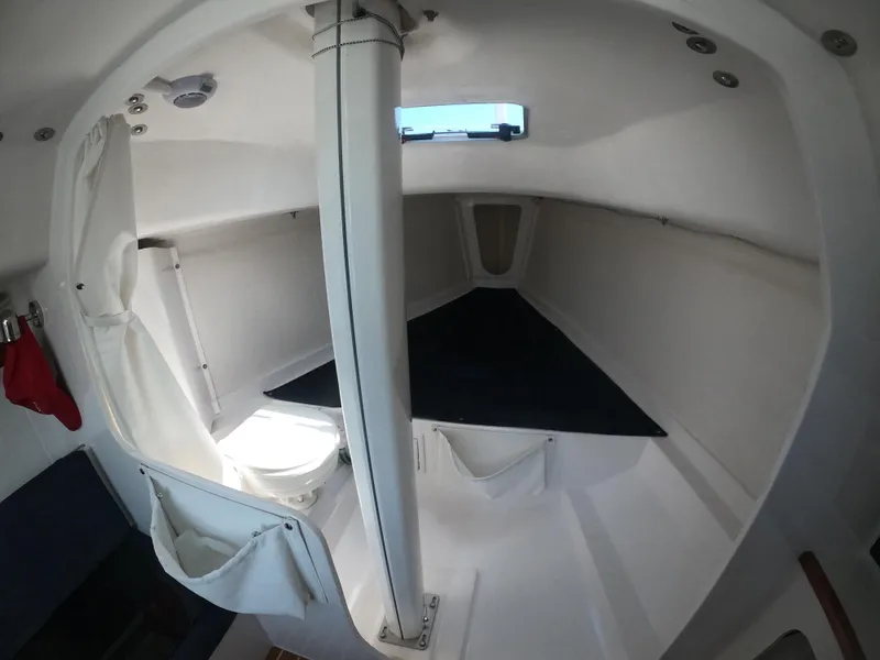 Slide: The Image of Interior cabin of 2022 J Boats J/9 sailboat, featuring a compact and functional design. - 23