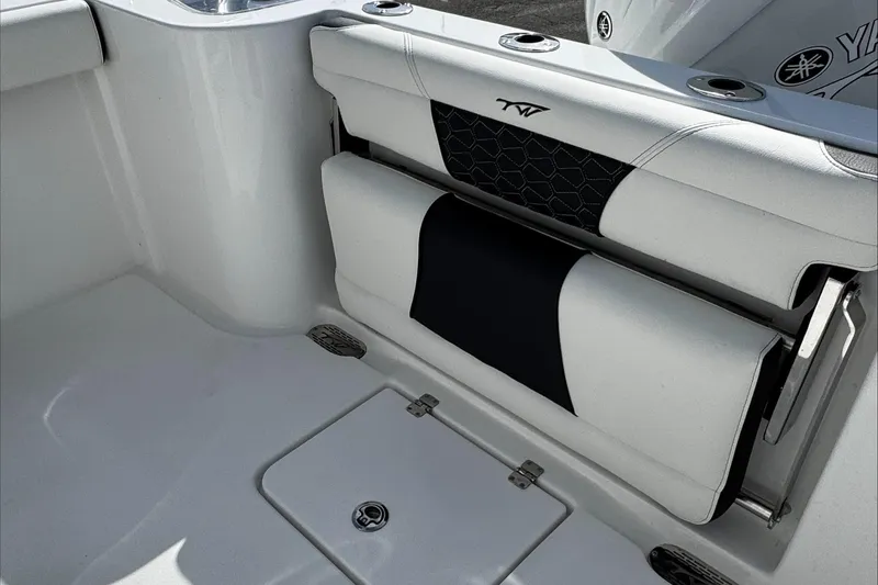 Slide: The Image of 2025 Tidewater 232 CC Adventure boat interior seating detail. - 13