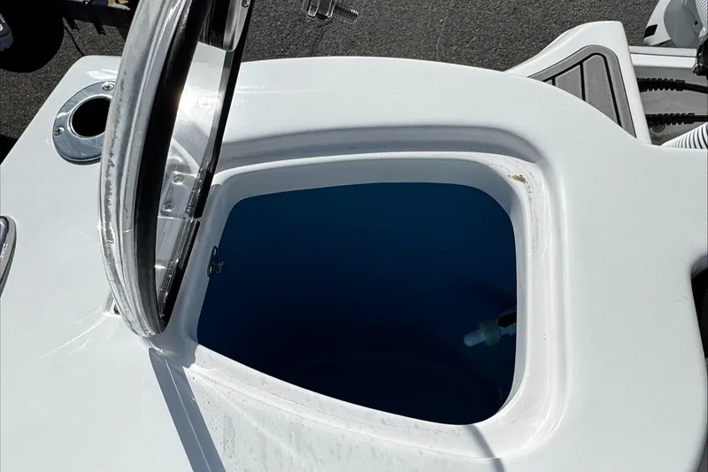 Slide: The Image of Open storage compartment on 2025 Tidewater 232 CC Adventure boat. - 16