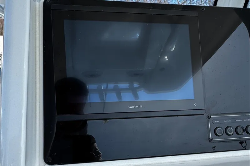 Slide: The Image of Garmin display on 2025 Tidewater 232 CC Adventure boat dashboard. - 20
