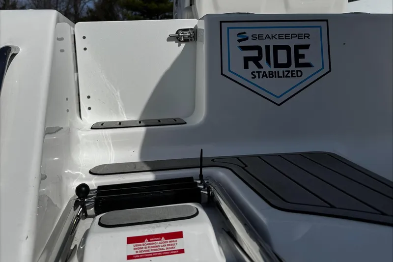 Slide: The Image of 2025 Tidewater 232 CC Adventure boat with Seakeeper Ride stabilization system. - 9