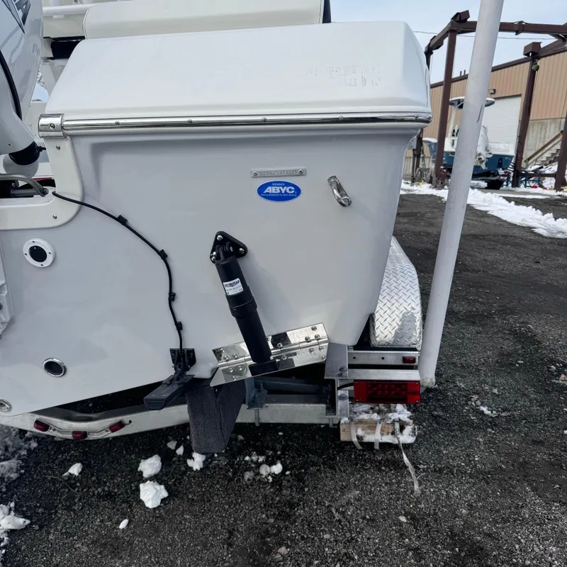 Slide: The Image of 2025 Tidewater 198 CC Adventure boat on trailer, rear view in snowy setting. - 10