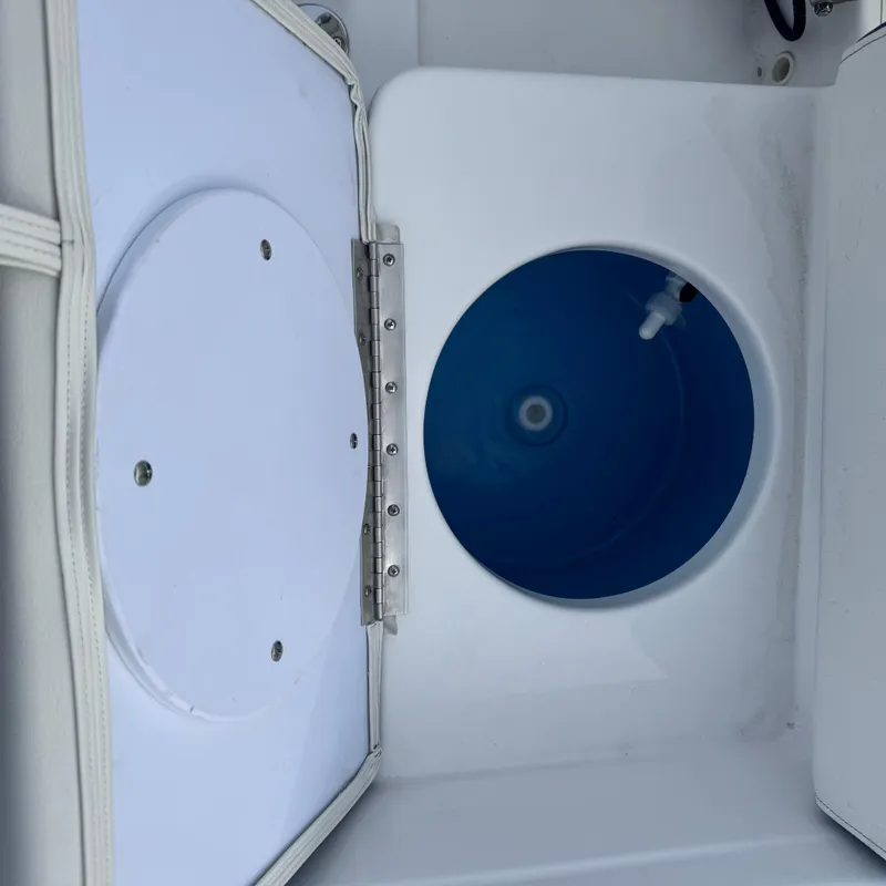 Slide: The Image of 2025 Tidewater 198 CC Adventure boat livewell interior view. - 18
