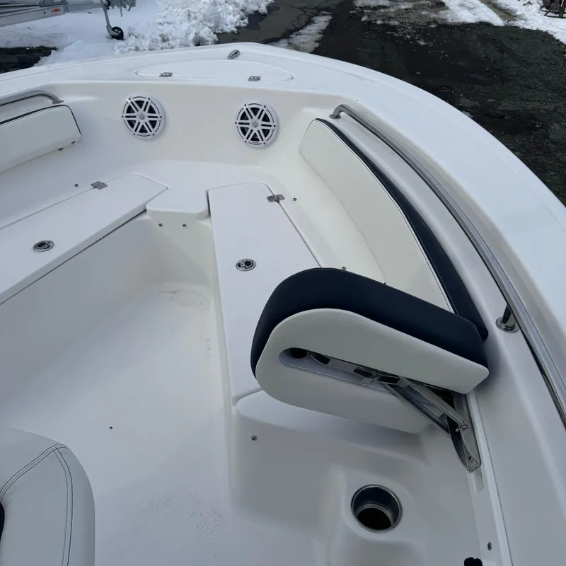 Slide: The Image of 2025 Tidewater 198 CC Adventure boat interior with seating and speakers. - 38