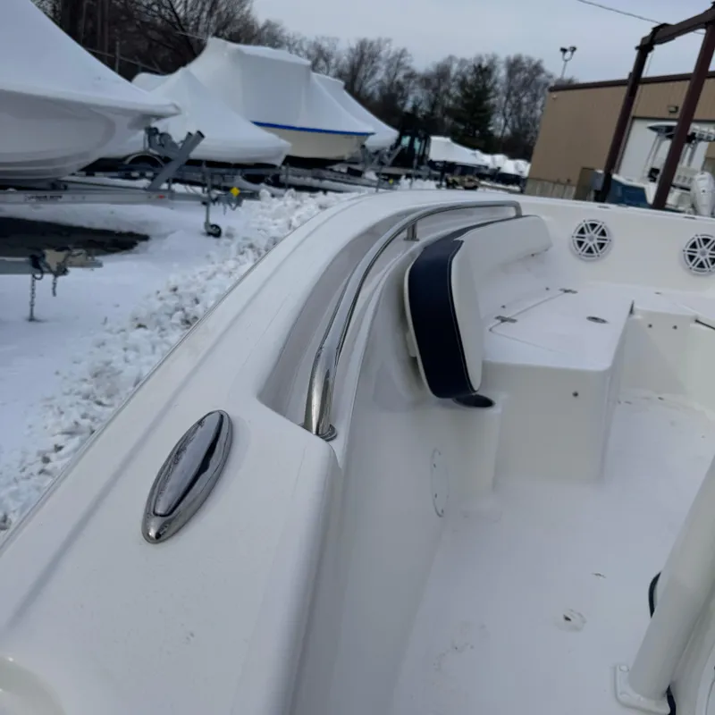 Slide: The Image of 2025 Tidewater 198 CC Adventure boat interior with snow-covered surroundings. - 46