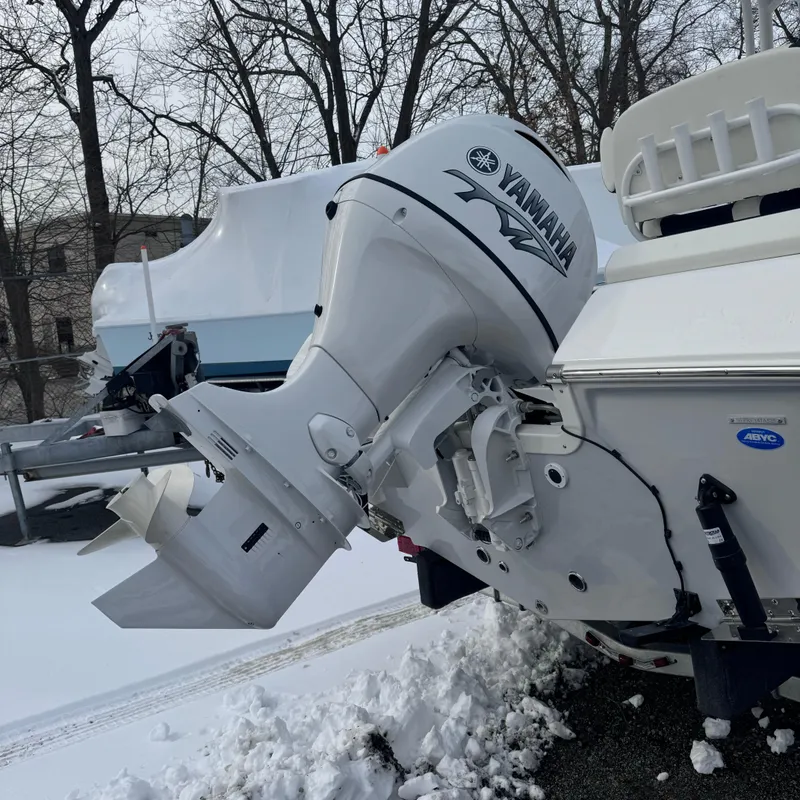 Slide: The Image of 2025 Tidewater 198 CC Adventure boat with Yamaha outboard motor in snowy setting. - 5