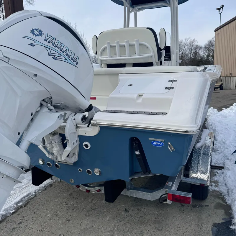 Slide: The Image of 2025 Tidewater 220 LXF boat with Yamaha engine on trailer, rear view. - 4