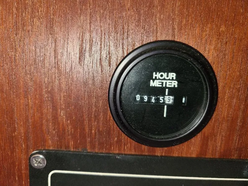 Slide: The Image of Hour meter reading 9459 on 1985 O'Day 35 boat, mounted on wooden panel. - 22