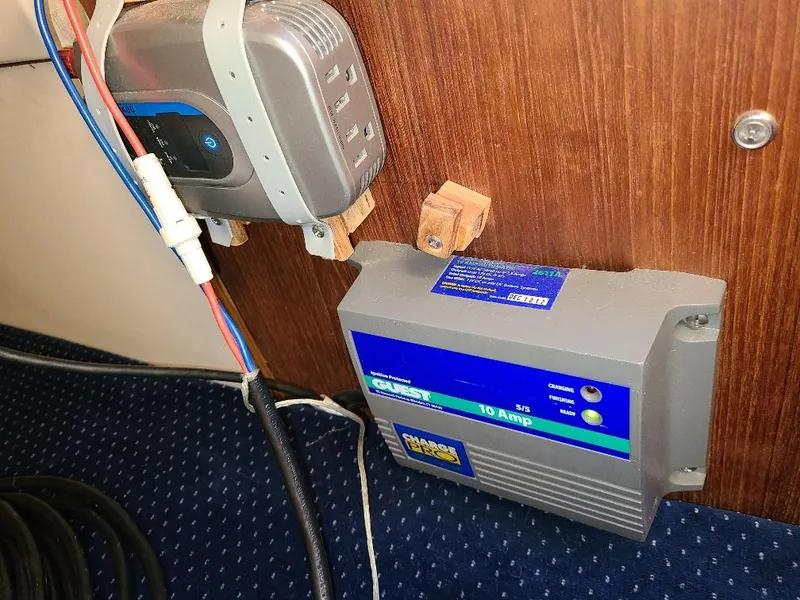 Slide: The Image of Battery charger setup in 1985 O'Day 35 sailboat interior. - 28