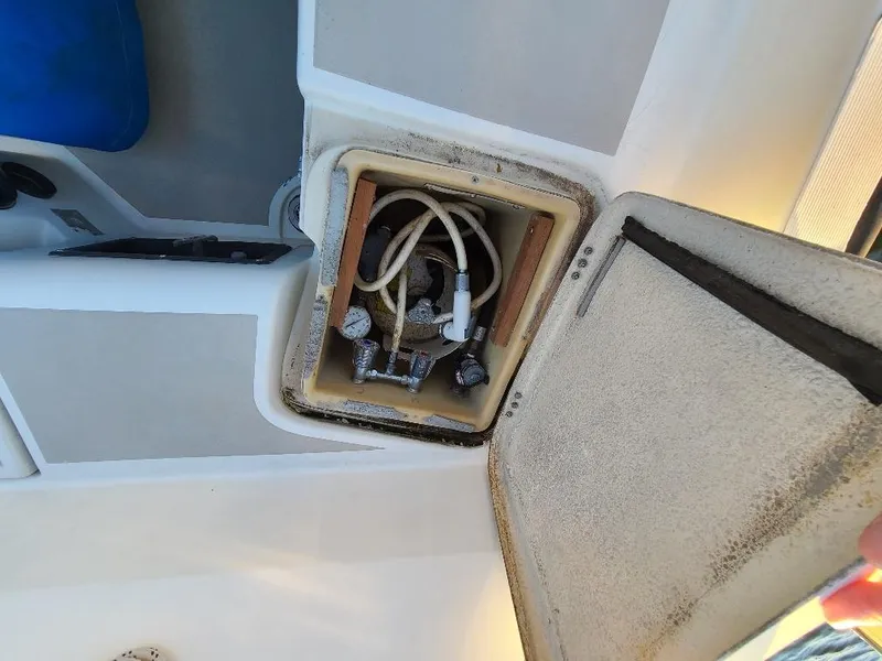 Slide: The Image of Open hatch on 1985 O'Day 35 sailboat showing interior components and wiring. - 8