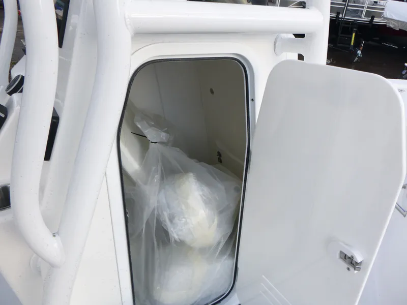 Slide: The Image of 2025 Sea Pro 230 Bay boat interior with steering wheel and control panel. - 12