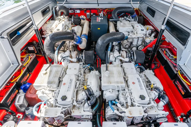 Slide: The Image of 2018 Nor-Tech 560 Sport Center Console engine compartment with powerful marine engines. - 28