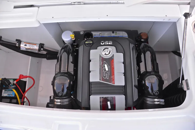 Slide: The Image of 2021 Four Winns HD3 engine compartment with a powerful 250 HP motor. - 29