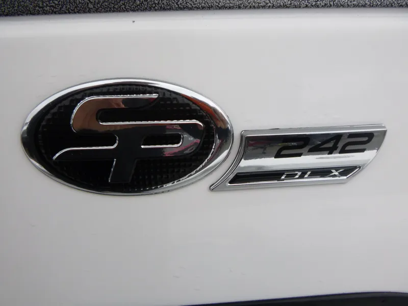 Slide: The Image of 2025 Sea Pro 242 Center Console emblem on white surface. - 17