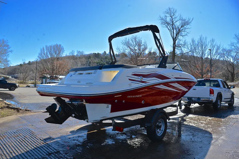Slide: The Image of 2020 Bayliner VR5 boat on trailer, parked outdoors on a sunny day. - 10