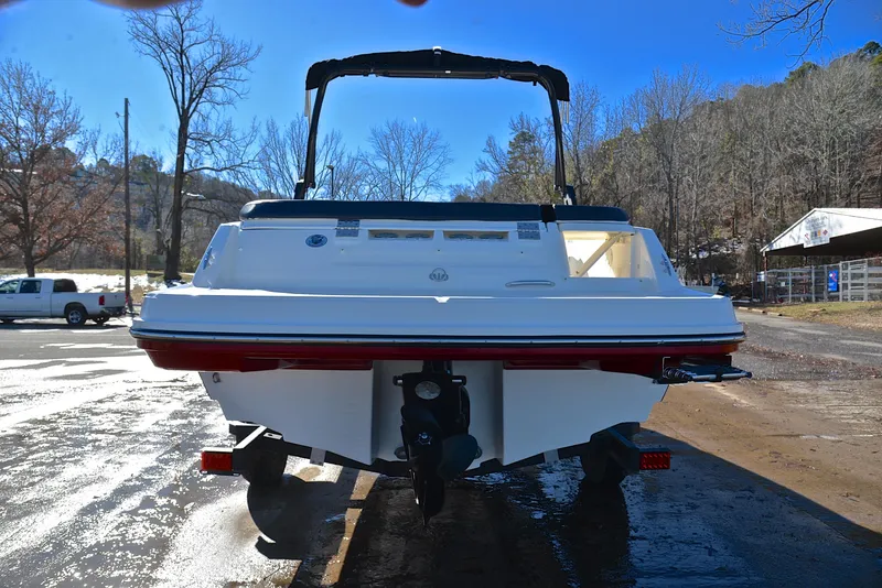 Slide: The Image of 2020 Bayliner VR5 boat on trailer, rear view, parked outdoors. - 9