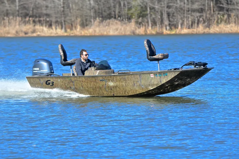 The Image of 2016 G3 Eagle 176 boat speeding on a lake with a Yamaha motor. - 1