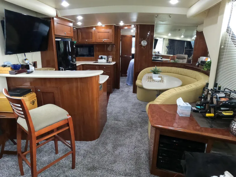 Slide: The Image of Luxurious interior of a 2006 Bluewater Yachts 5200 with modern amenities and elegant furnishings. - 28
