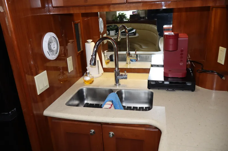 Slide: The Image of 2006 Bluewater Yachts 5200 kitchen with sink, faucet, and coffee maker. - 38