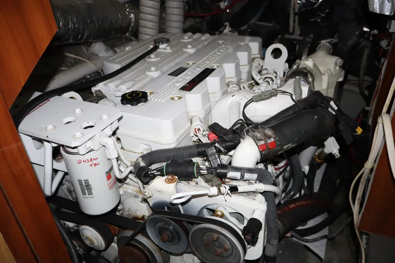 Slide: The Image of Engine room of 2006 Bluewater Yachts 5200, showcasing detailed mechanical components and systems. - 41