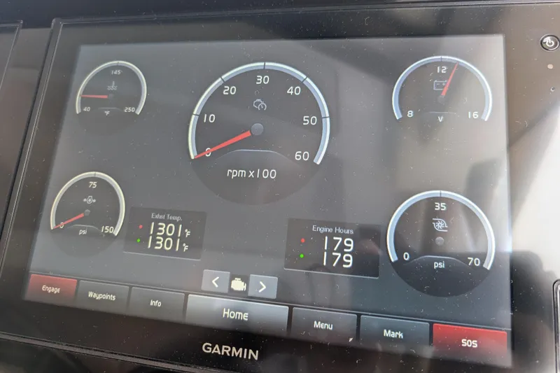 Slide: The Image of Garmin display on 2020 Regal 38 Grande Coupe showing engine metrics and gauges. - 20