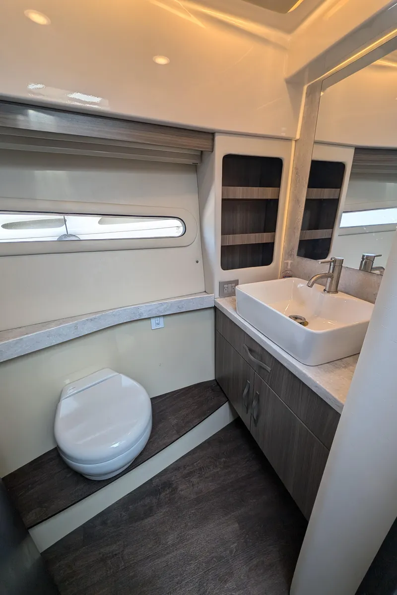 Slide: The Image of 2020 Regal 38 Grande Coupe bathroom with modern fixtures and sleek design. - 22