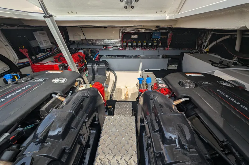 Slide: The Image of Engine room of 2020 Regal 38 Grande Coupe with dual engines and control systems. - 26