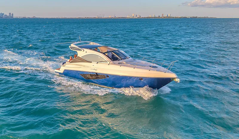 Slide: The Image of 2023 Schaefer 375 yacht cruising on open blue waters. - 1