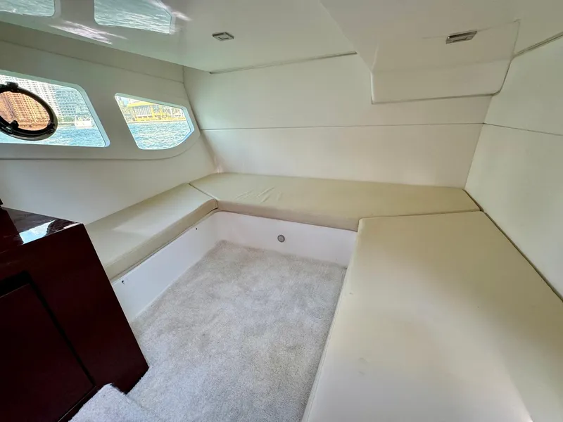 Slide: The Image of Luxurious interior of 2023 Schaefer 375 yacht with plush seating and modern design. - 15