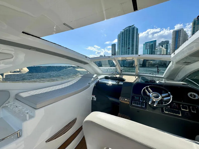 Slide: The Image of Interior view of 2023 Schaefer 375 yacht with city skyline in background. - 22