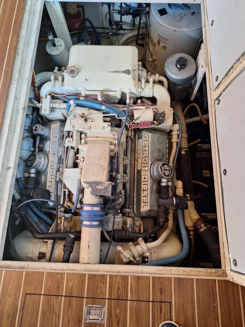 Slide: The Image of 1970 Hatteras 45 Sportfish engine compartment with Detroit Diesel engine. - 26