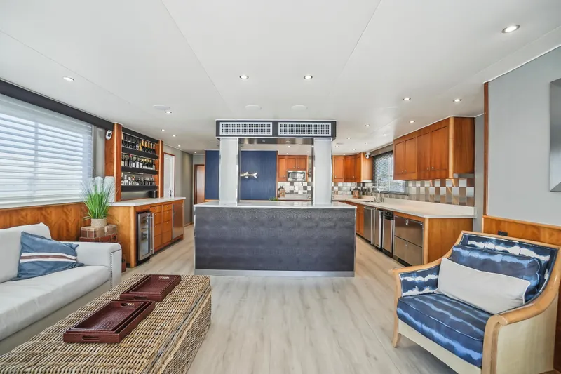 Slide: The Image of Luxurious 2009 Custom Flybridge Motoryacht interior with modern kitchen and stylish seating area. - 22
