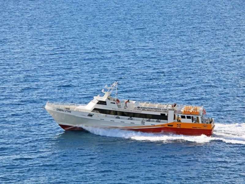 Slide: The Image of High-speed passenger ferry by Midship Marine, 1981, cruising on open water. - 14