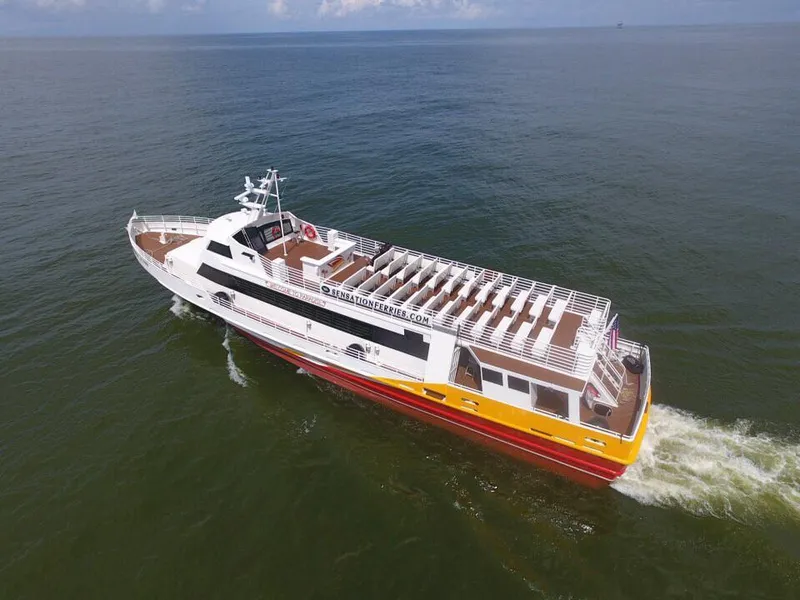 Slide: The Image of High-speed passenger ferry by Midship Marine, 1981, cruising on open water. - 20