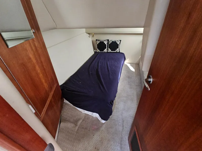 Slide: The Image of Small cabin with single bed in 2008 Riviera M470 yacht. - 18