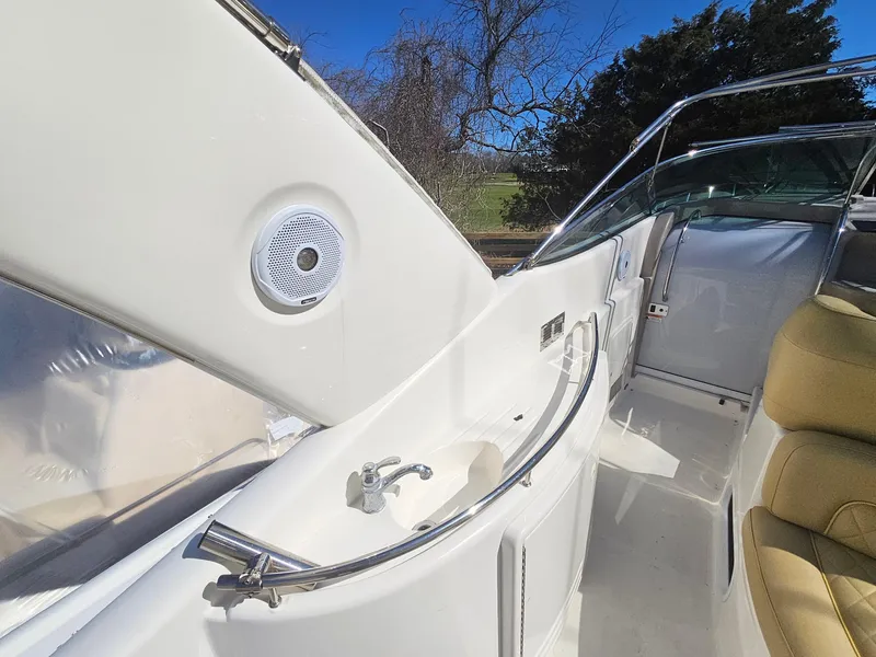 Slide: The Image of 2008 Riviera M470 yacht interior with sink and seating, featuring sleek design and modern amenities. - 7