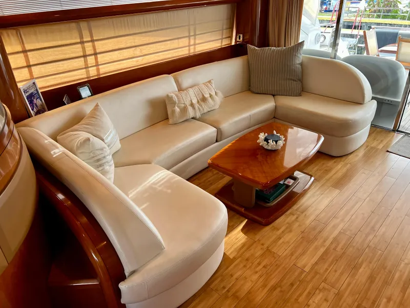 Slide: The Image of Luxurious interior of 2008 Viking Sport Cruisers 70 Motor Yacht with elegant seating and wooden flooring. - 15