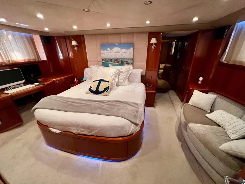 Slide: The Image of Luxurious bedroom interior of 2008 Viking Sport Cruisers 70 Motor Yacht with elegant decor. - 20