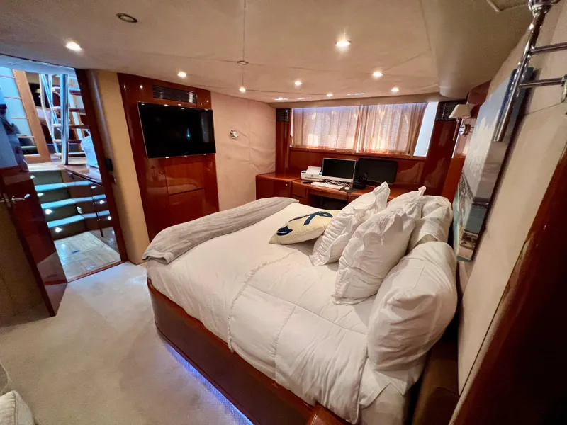 Slide: The Image of Luxurious bedroom in 2008 Viking Sport Cruisers 70 Motor Yacht with modern amenities. - 21