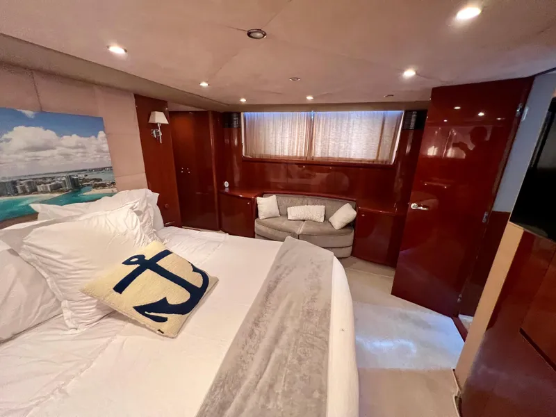 Slide: The Image of Luxurious bedroom in 2008 Viking Sport Cruisers 70 Motor Yacht with nautical decor. - 23