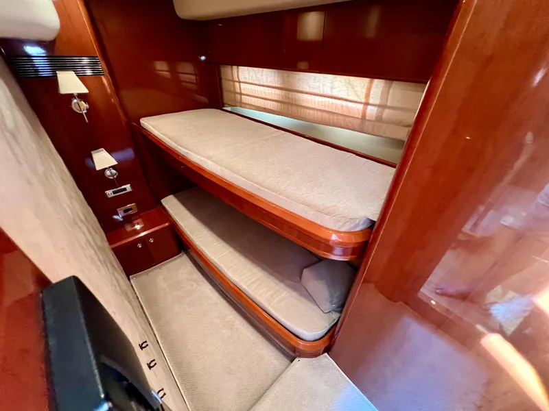 Slide: The Image of Interior of 2008 Viking Sport Cruisers 70 Motor Yacht with wooden bunk beds. - 27