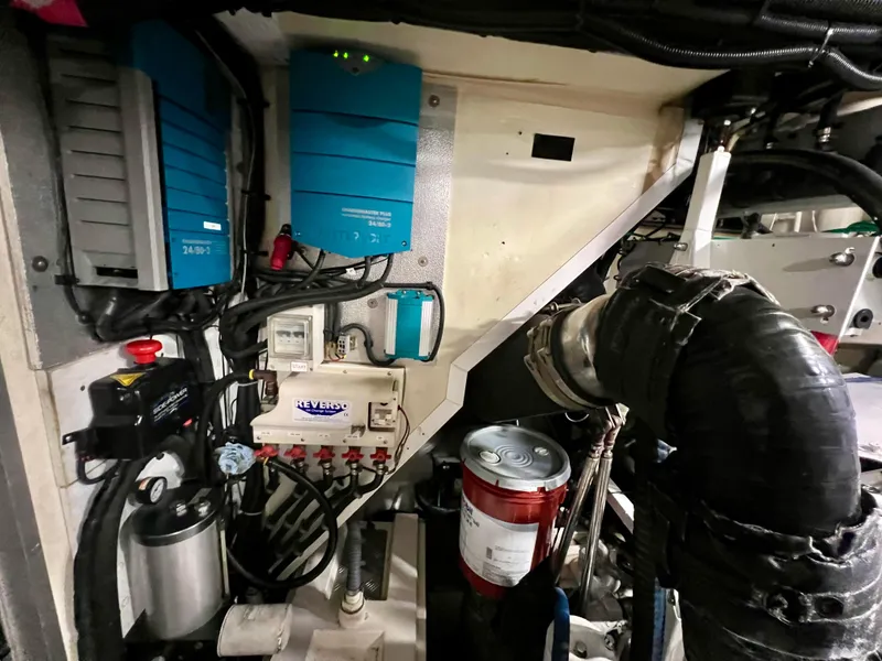Slide: The Image of Engine room of 2008 Viking Sport Cruisers 70 Motor Yacht with electrical components and machinery. - 36
