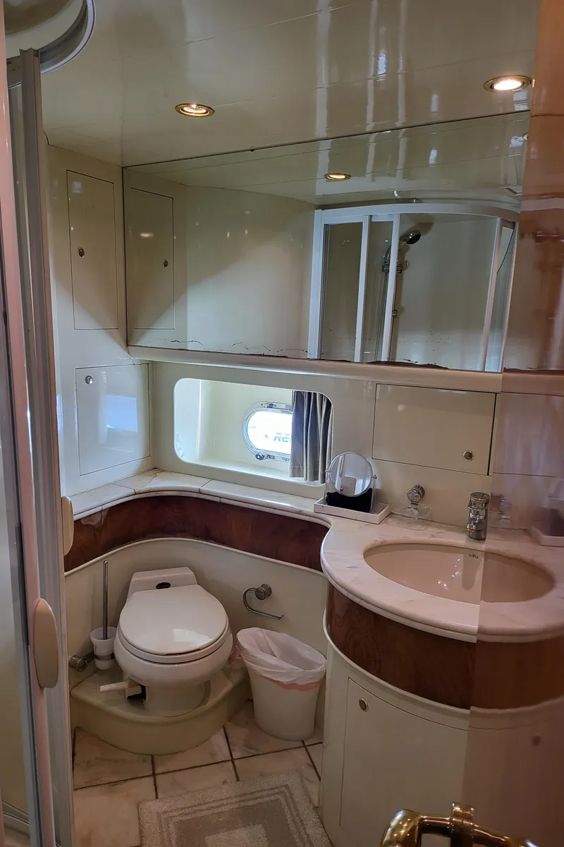 Slide: The Image of Luxurious bathroom in 2000 Horizon 74 Motor Yacht with modern fixtures and ample lighting. - 31