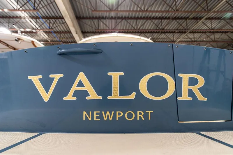 Slide: The Image of Hinckley Talaria 34 boat named "Valor" in a warehouse, Newport, 2014 model. - 23