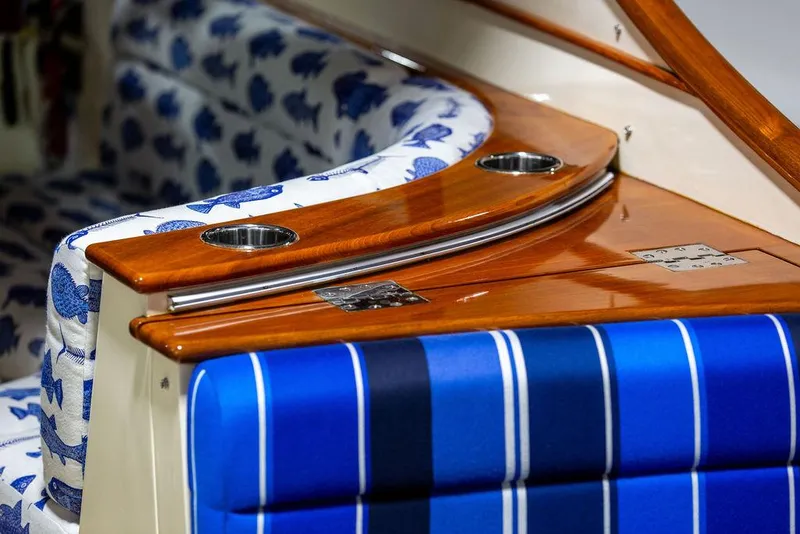 Slide: The Image of Luxurious 2014 Hinckley Talaria 34 yacht bathroom with wood accents and modern fixtures. - 6