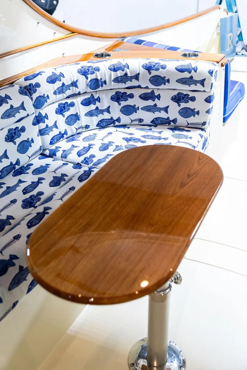 Slide: The Image of Hinckley Talaria 34 2014 boat controls with polished chrome and wood accents. - 8