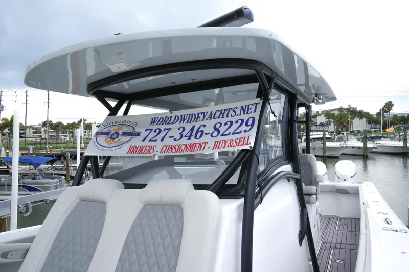 Slide: The Image of 2023 Front Runner 39 CC boat with brokerage sign at marina. - 10