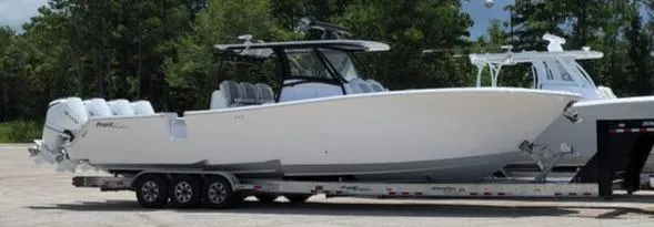 Slide: The Image of 2023 Front Runner 39 CC boat on trailer, side view. - 15
